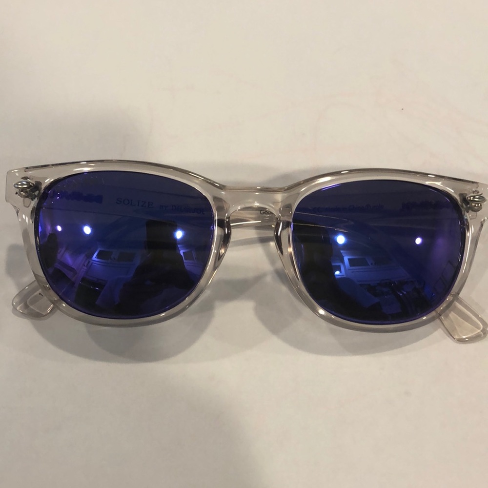 Del Sol sunglasses. Women’s clear with purple lens